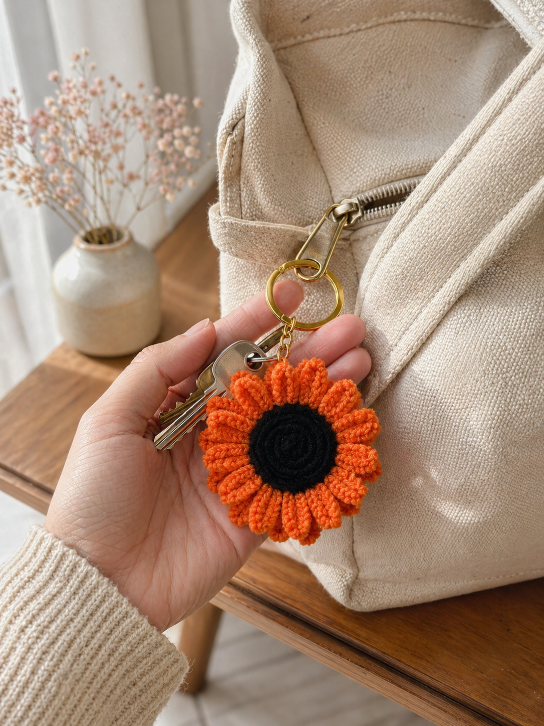 Crochet Sunflower Keychain — Orange on Backpack