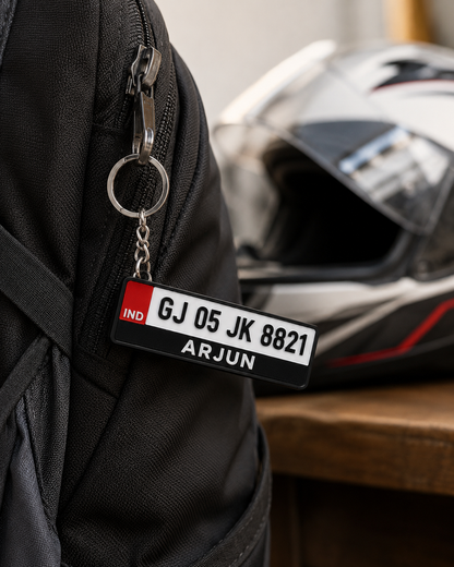 Number plate keychain clipped on a backpack with helmet